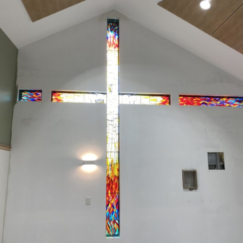 Stained Glass Pentecost Cross Catholic Healthcare Casula and Norwest NSW
